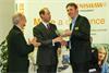 HRH The Earl of Wessex presents the Queens Award bowl to Dave Wallace Director of Renishaw's CMM Products Division